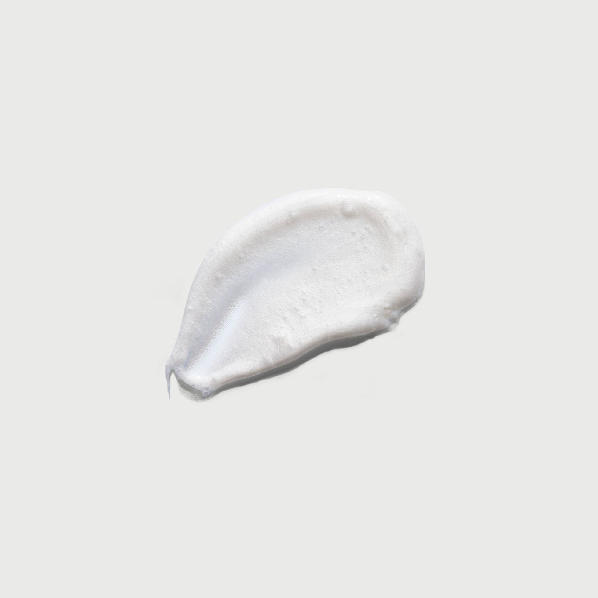 the-smoother-glycolic-acid-exfoliating-body-wash-z5 NATR-40002-Swatch-The-Smoother-Glycolic-Acid-Exfoliating-Body-Wash-bonebkgd.jpg