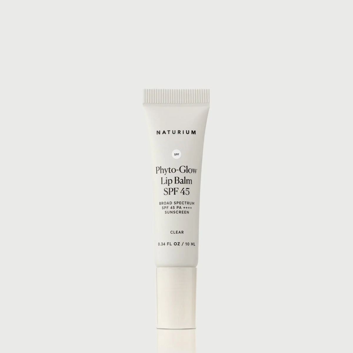 phyto-glow-lip-balm-spf-45-clear-l5 NATR-10124_PhytoGlow_SPF_Clear_primary_capon_front_bonebkgd_1.webp