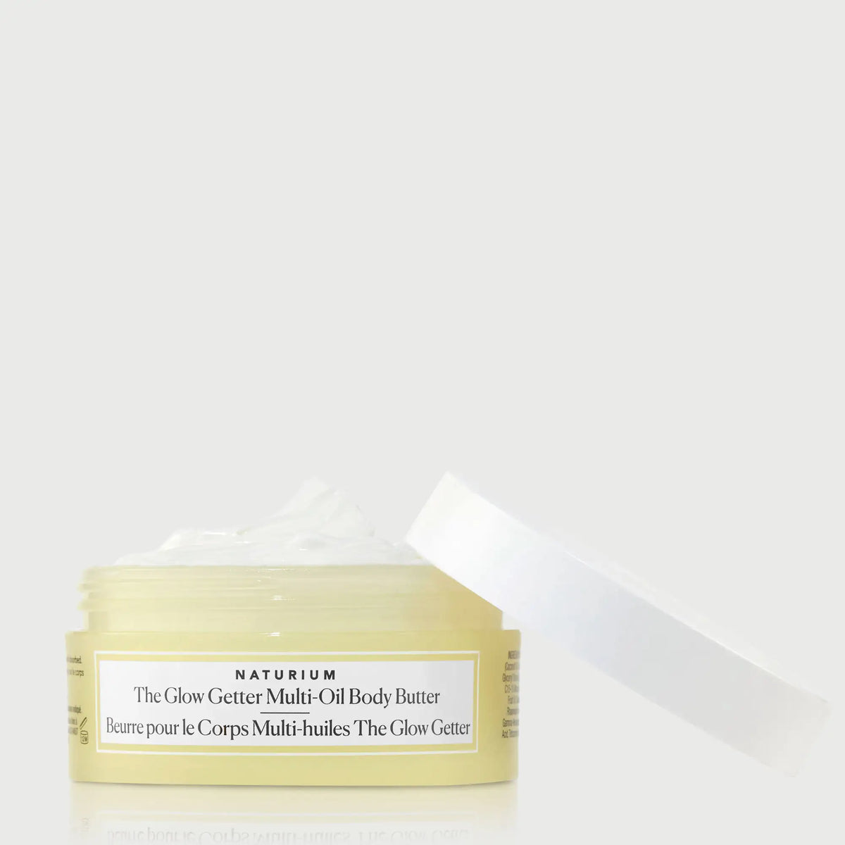 the-glow-getter-multi-oil-body-butter-travel-size-m6 NATR-40115_Glow-Getter-Body-Butter-Mini_front_capoff_bonebkgd.webp